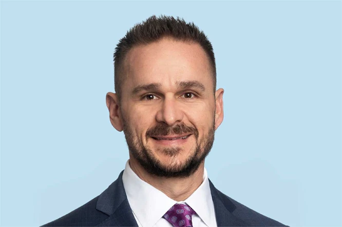 Christopher E. Baker, MD