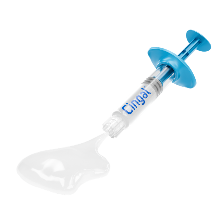 Clear medical syringe with blue plunger and "Cingal" branding on white background.