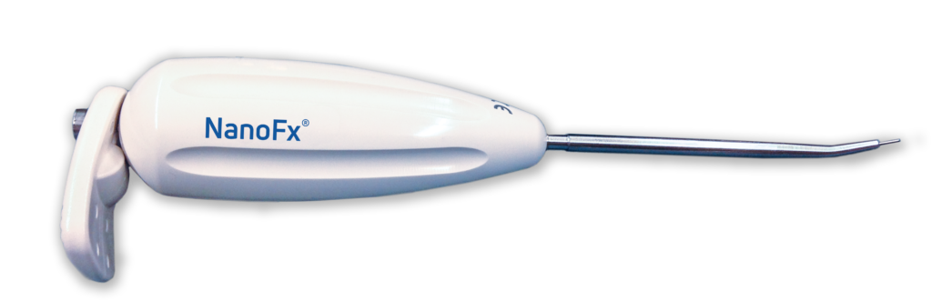 White handheld NanoFx medical device with curved handle and thin metal probe tip extending from the right side.